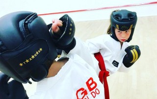 Two girls sparring in Warren Vice 121